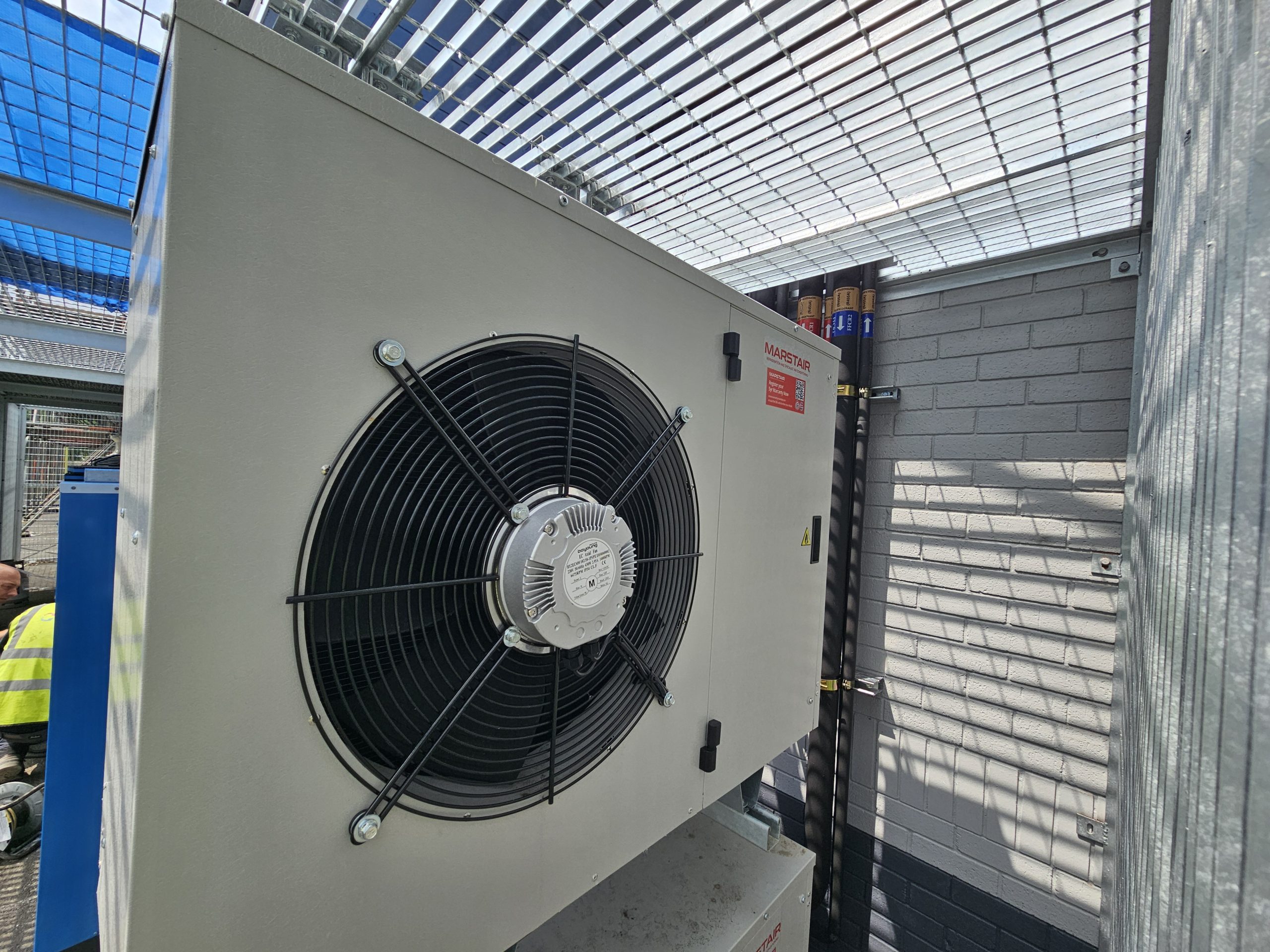 Classroom setting for A2L refrigerant training with instructor and trainees in 2026